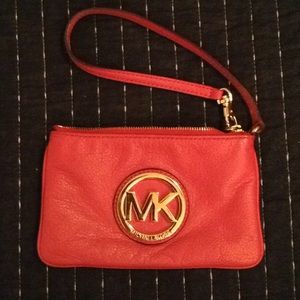 Michael Kors fuchsia wristlet